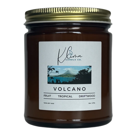 Volcano Candle by Klima Candle Co. – A tropical candle with pineapple, mango, and driftwood, evoking a beachy paradise.